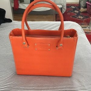 Brand new orange Kate Spade purse